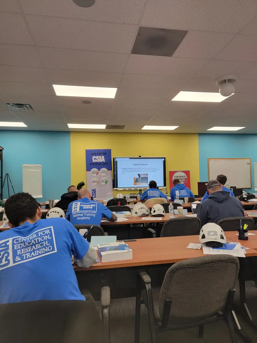 Green and Clean technicians in a CSIA training classroom