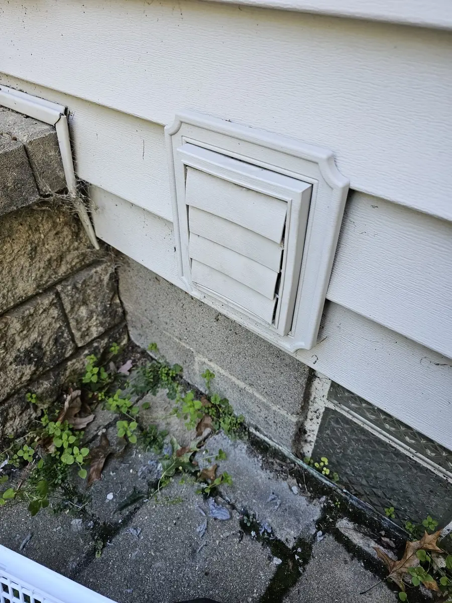 New exterior vent cover before