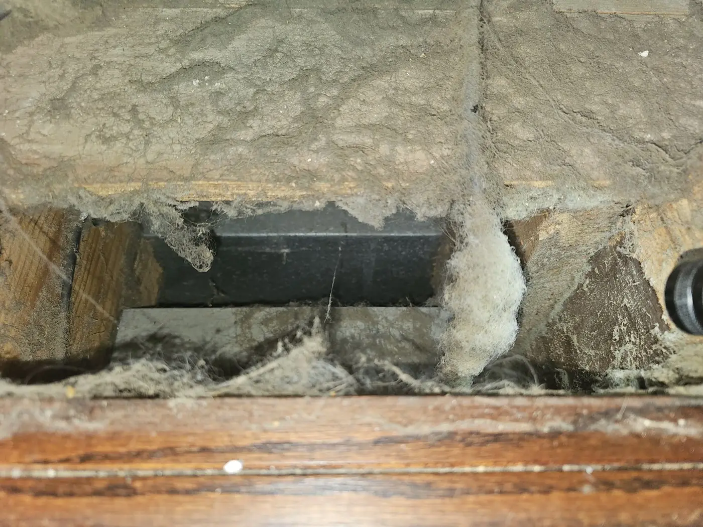 Hypervac negative air machine connected in a basement