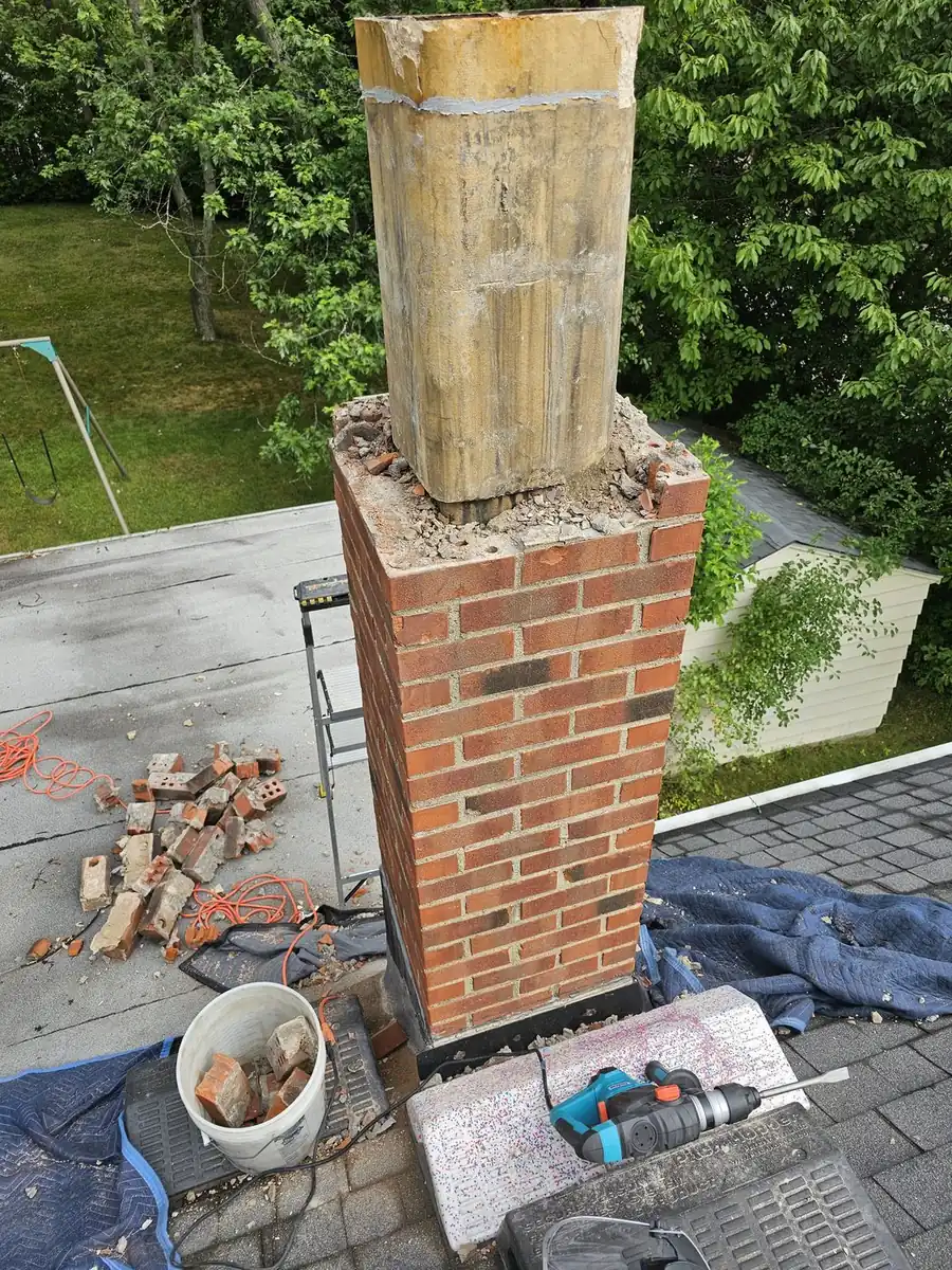 Chimney taken down and rebuilt before