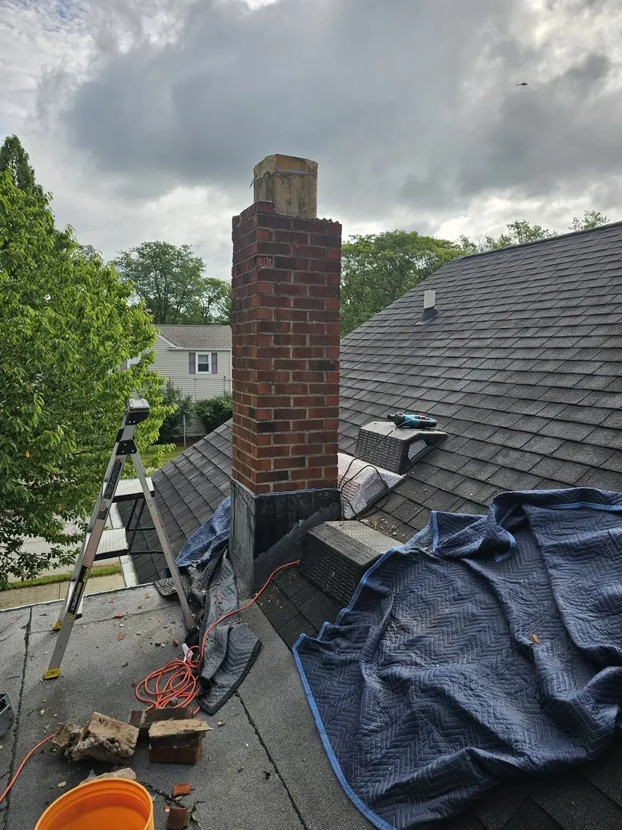 Chimney brick repair on a home in Aurora, Ohio