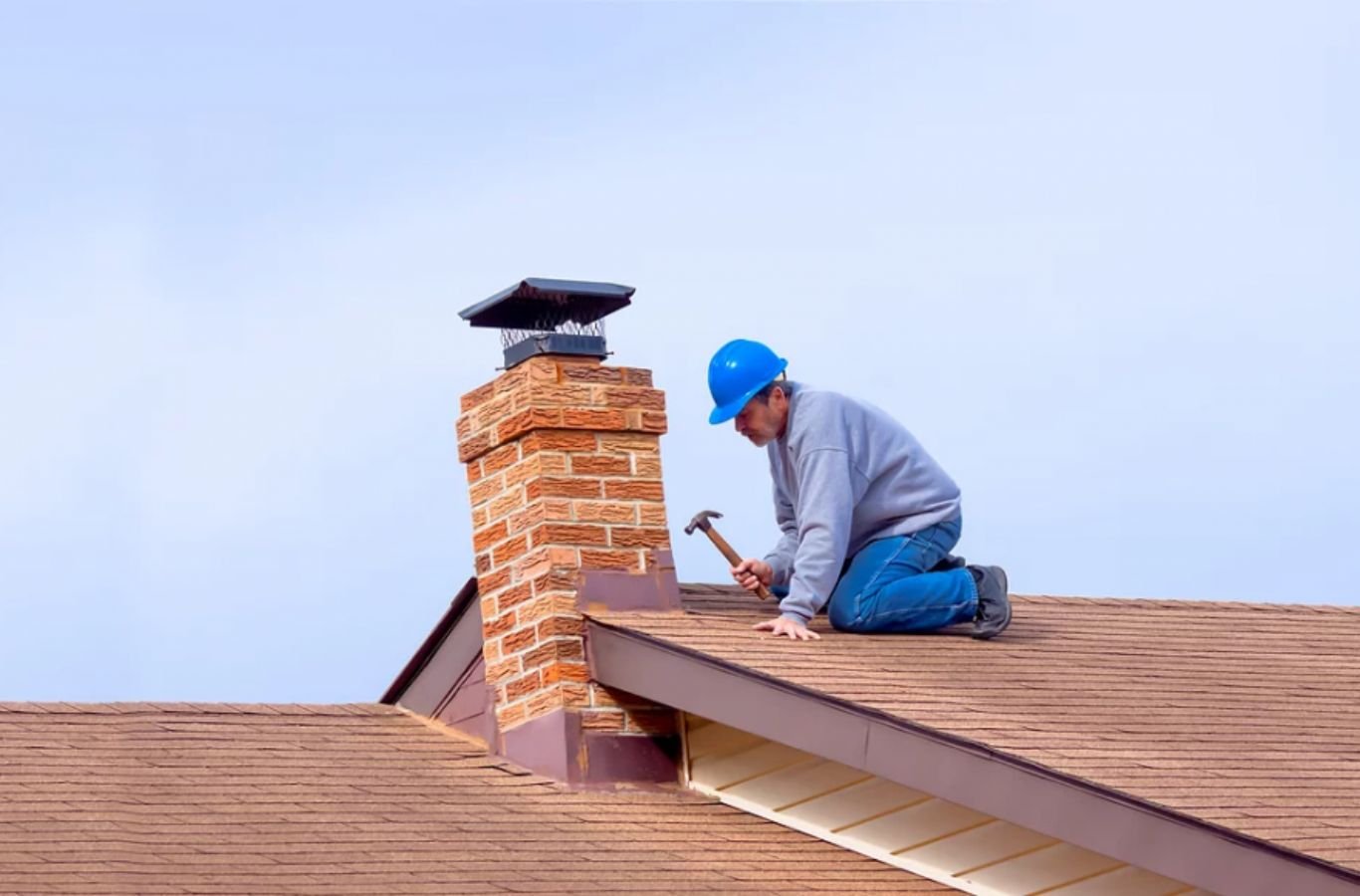Green and Clean Home Services technician performing chimney cleaning in Chardon, Ohio.