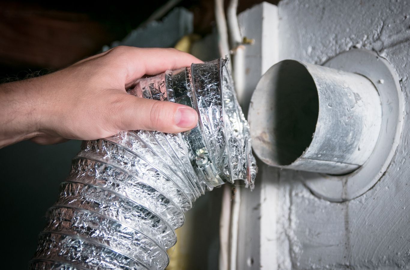 A Green and Clean Home Services technician cleaning air ducts in a Chardon, Ohio home.