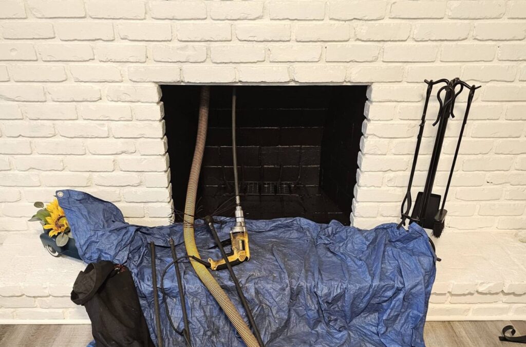 An expert delivering chimney cleaning services in Brunswick, OH, showing why Green and Clean Home Services is the best choice. Chimney Cleaning Near Me.