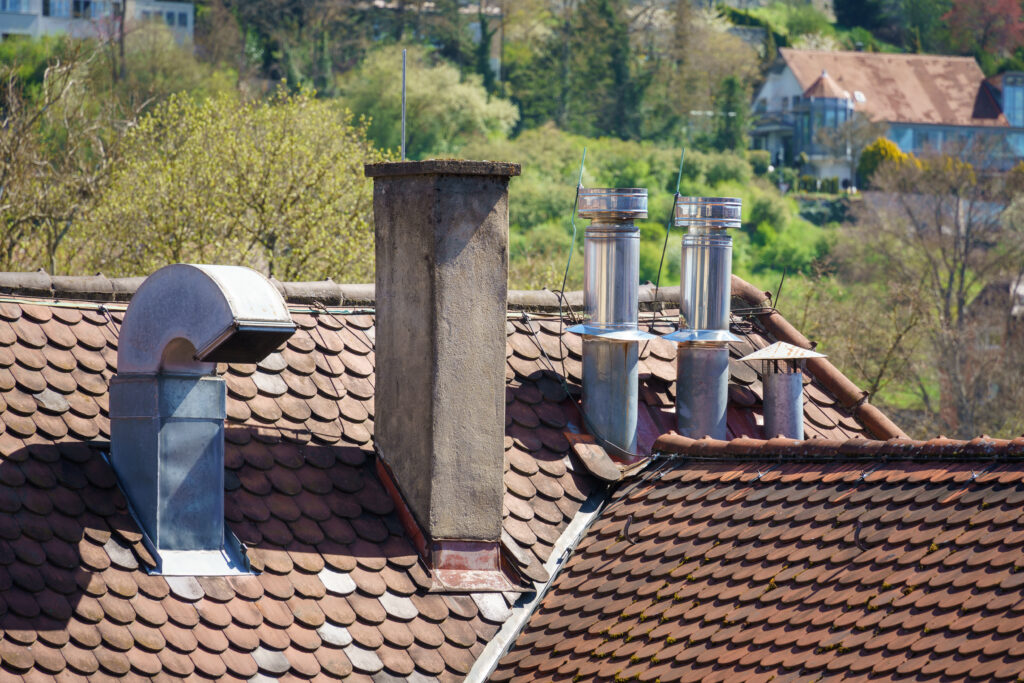 Roof with different chimneys
