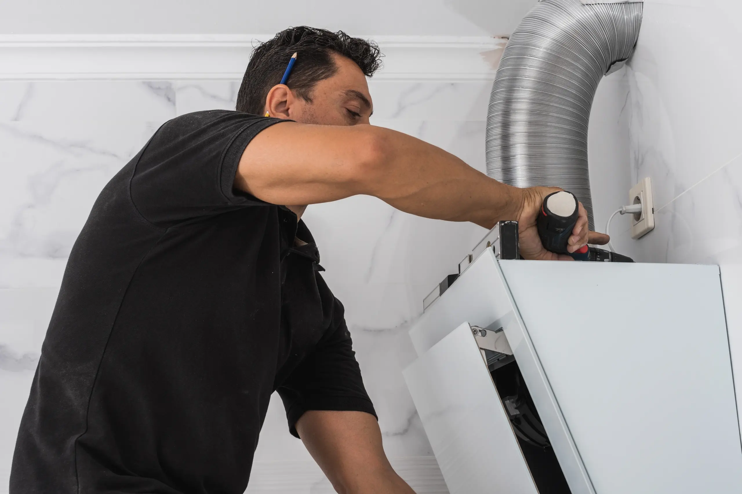 man installing ventilation hood in kitchen 2026 03 09 09 15 36 utc jpg