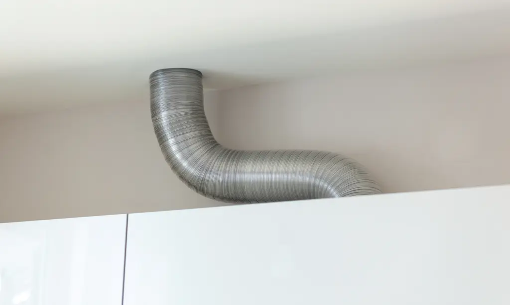 silver ducting pipe connecting to white ceiling 2026 03 24 08 48 34 utc jpg